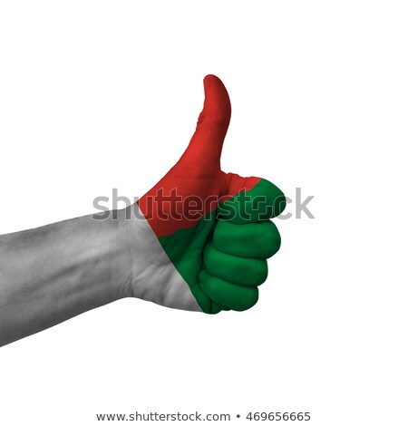 Stockfoto: Madagascar National Flag Thumb Up Gesture For Excellence And Ach