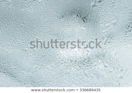 Stock photo: Frozen Water Drops On Glass