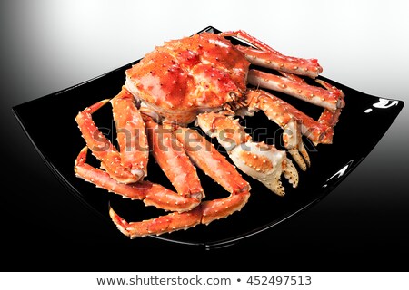 [[stock_photo]]: Red King Crab Served On Black Square Plate