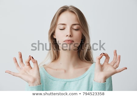 Stock photo: Casual Woman Posing With Eyes Closed