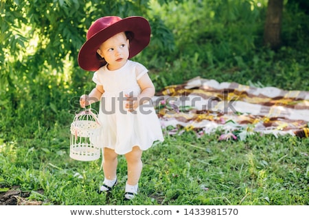 Foto stock: Blonde Girl In A Spring Garden