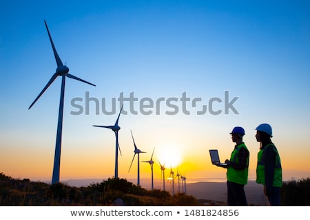 Stockfoto: A Technician Woman Engineer In Wind Turbine Power Generator Station