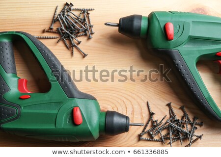 Foto stock: Drill On Wooden Table