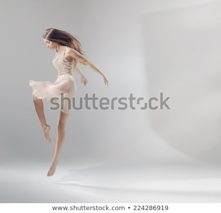 Foto stock: Portrait Of Acrobat Woman Stretching