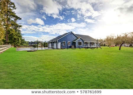 Foto stock: House And Grass At The Front