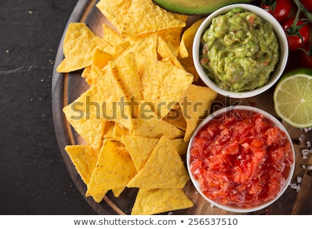 Foto stock: Guacamole Tomato Sauce Salsa And Chips Nachos