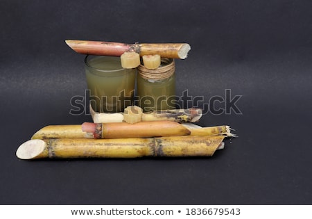 Сток-фото: Brown Cane Sugar In Glass Jar Isolated On White Background