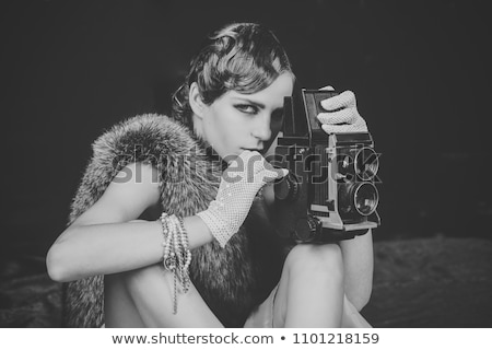 Stock fotó: Young Woman With Retro Film Camera