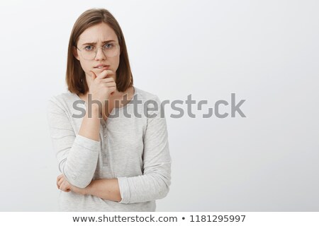 Foto stock: Woman In Anxious Pose On White Background