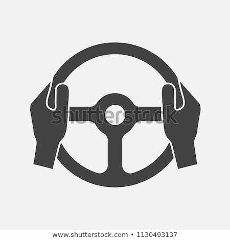 Сток-фото: Drivers Hands On A Steering Wheel Of A Car