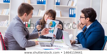 Concerned Office Worker Working With Bar Charts Stock photo © Elnur