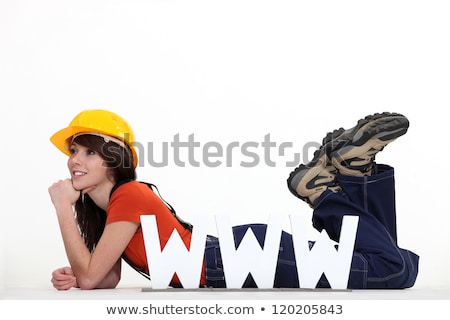 Stockfoto: Female Builder Laying By Large Www Letters