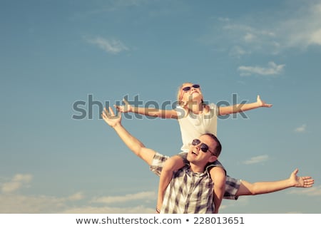 Foto stock: Little Girl Play With Dad In Nature