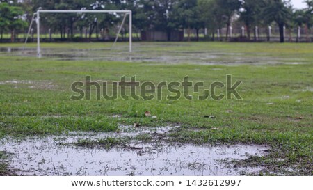 Stok fotoğraf: Football Goal In A Flooded Field