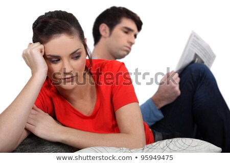 Stock photo: Bored Brunette Sat With Boyfriend