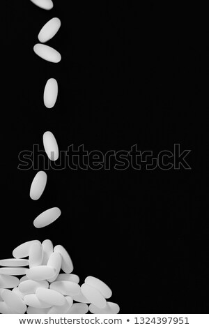 Stock photo: Pile Of White Tablets