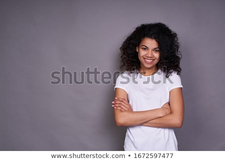Foto stock: Pretty Young Curly African Woman Posing Over White Background