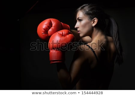 Foto stock: Beautiful Woman With The Red Boxing Gloves