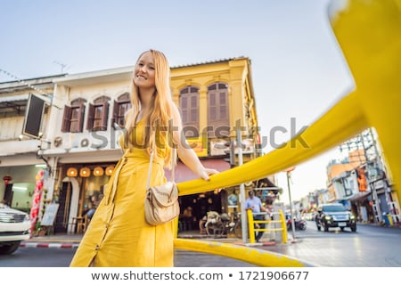 Stock photo: Woman Tourist On The Street In The Portugese Style Romani In Phuket Town Also Called Chinatown Or T