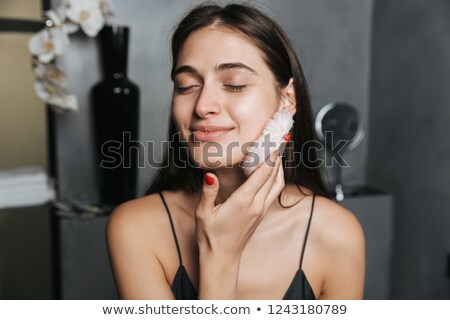 Stock photo: Photo Of Nice Woman With Long Dark Hair Standing At Bathroom An