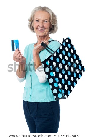 Stockfoto: Senior Woman With Shopping Bags And Credit Card