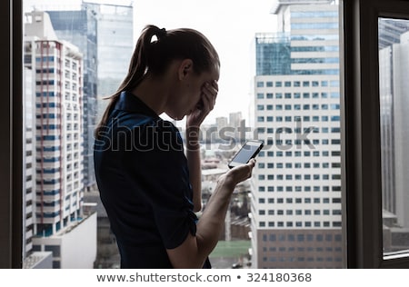 Stock foto: Businesswoman Receiving Bad News On The Phone