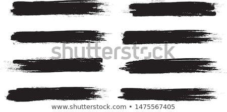Foto stock: Paintbrush With White Paint In Hand