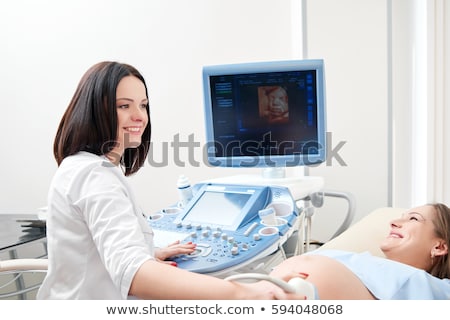 Stock fotó: Pregnant Woman And Doctor Hands With Ultrasound Equipment