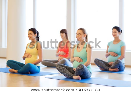 Foto stock: Pregnant Woman Yoga Meditation