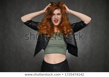 Stok fotoğraf: Elegant Young Woman With Excellent Classic Hairstyle