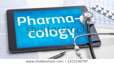 Stockfoto: Tablet With The Medical Specialty Pharmacology On The Display