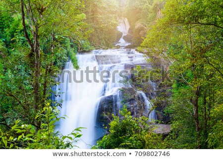 Foto d'archivio: Tropical Rain Forest Landscape With Sirithan Waterfall