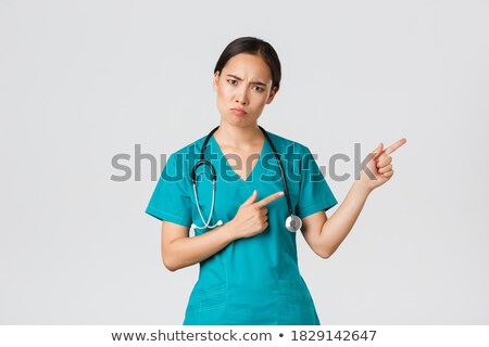 ストックフォト: Asian Female Surgeon Looking Angry