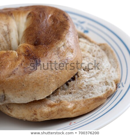 ストックフォト: Cinnamon Raisin Bagel Against White Background