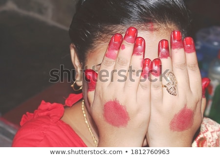 Foto stock: Shy Indian Girl Hiding Face Laughing