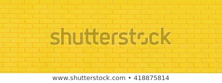 Stok fotoğraf: Yellow Brick Wall