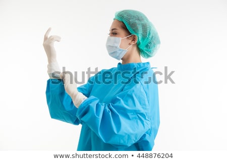Zdjęcia stock: Female Surgeon Puts On Protective Surgical Mask Before Operation