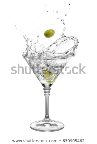 Foto stock: Glass With Martini And Green Olives