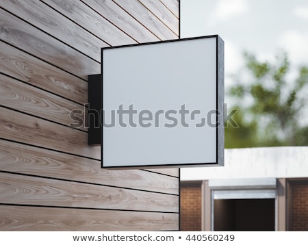 Stok fotoğraf: White Square Signboard On The Wall 3d Rendering