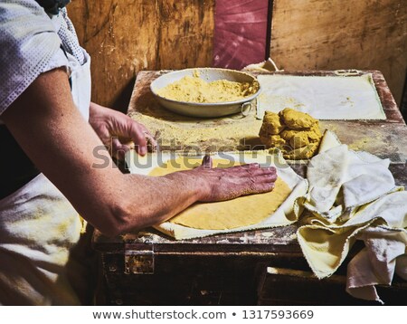 Stock photo: Cook Making Tortillas On A Wooden Rustic Table