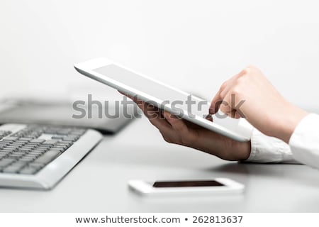 Foto stock: Close Up Of Hand Using Computer Touch Screen