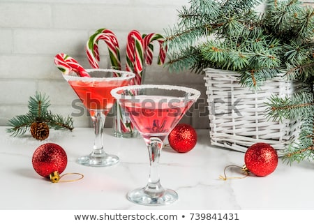 Stockfoto: Pink Peppermint Martini With Candy Cane Rim