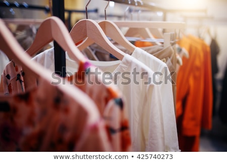 Foto stock: Fashion Clothing On Hangers In A Shop