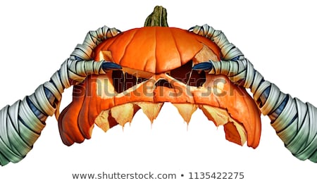 Foto d'archivio: Monster Holding Creepy Pumpkin