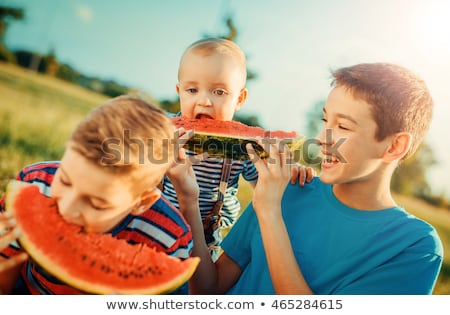 ストックフォト: Happy Friends Eating Watermelon At Summer Picnic