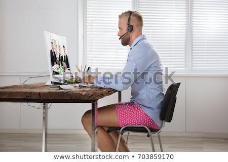 Zdjęcia stock: Businessman Having Video Call On Pc At Office