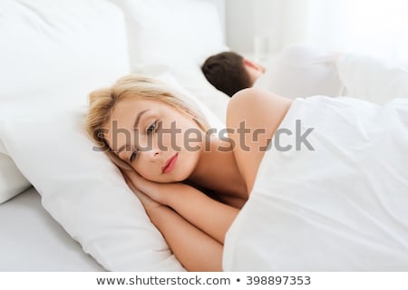 Foto d'archivio: Young Couple In Bed With Relation Problems