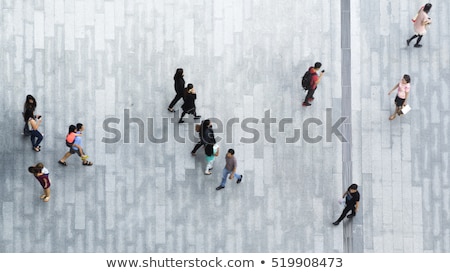 Foto stock: Crowd Of People With Umbrellas