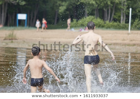 Сток-фото: Portrait Of A Beautiful Girl In The Pool Drops Of Water Run Down Her Body