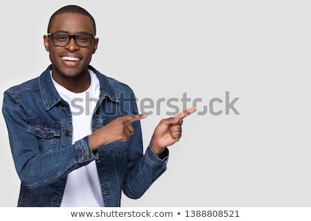 Foto stock: Image Of African American Guy Smiling And Pointing Finger At Cop